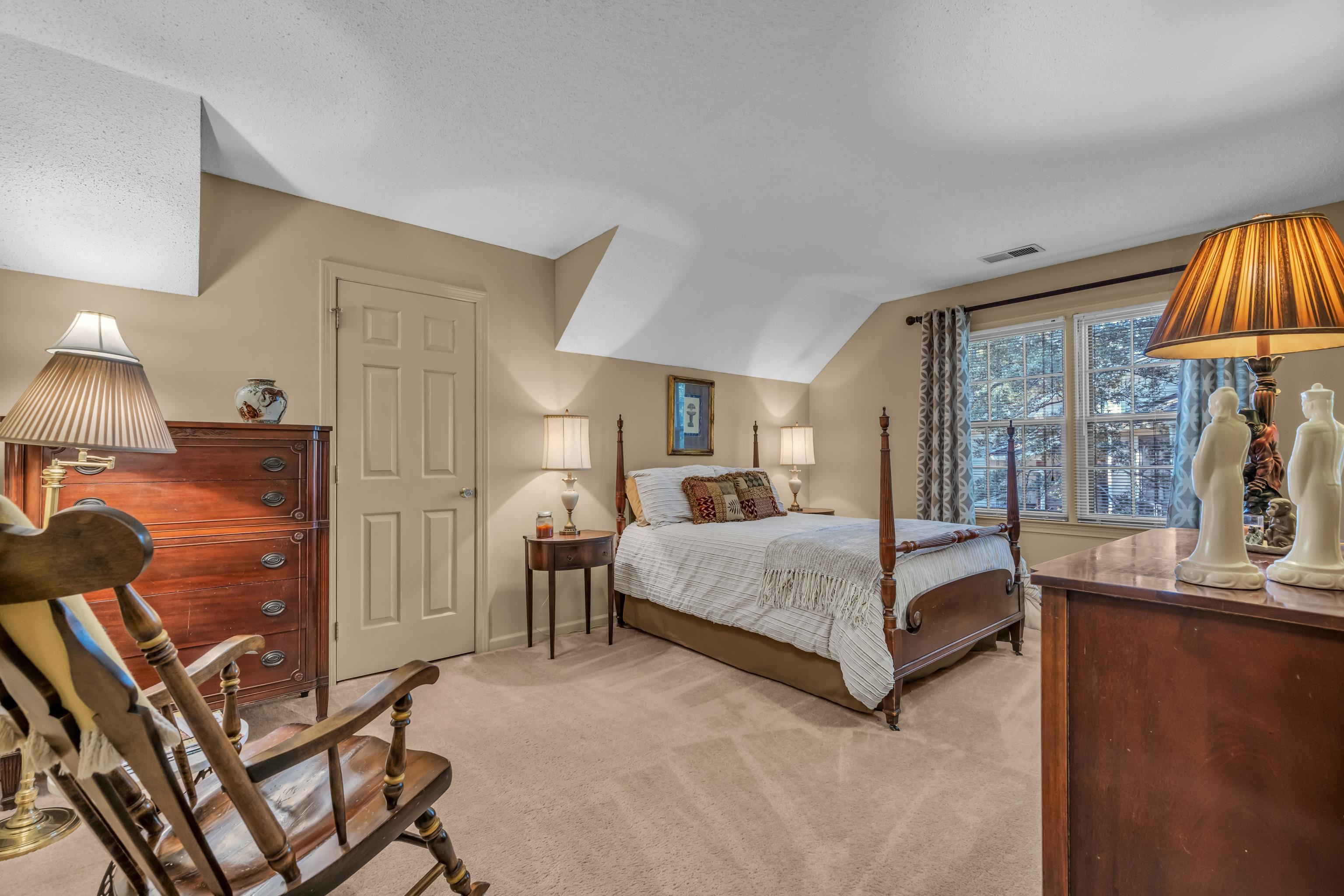 2002 Magnolia Ridge Cove Germantown, TN 38138 - Photo 27 of 40 Bedroom with vaulted ceiling and light carpet