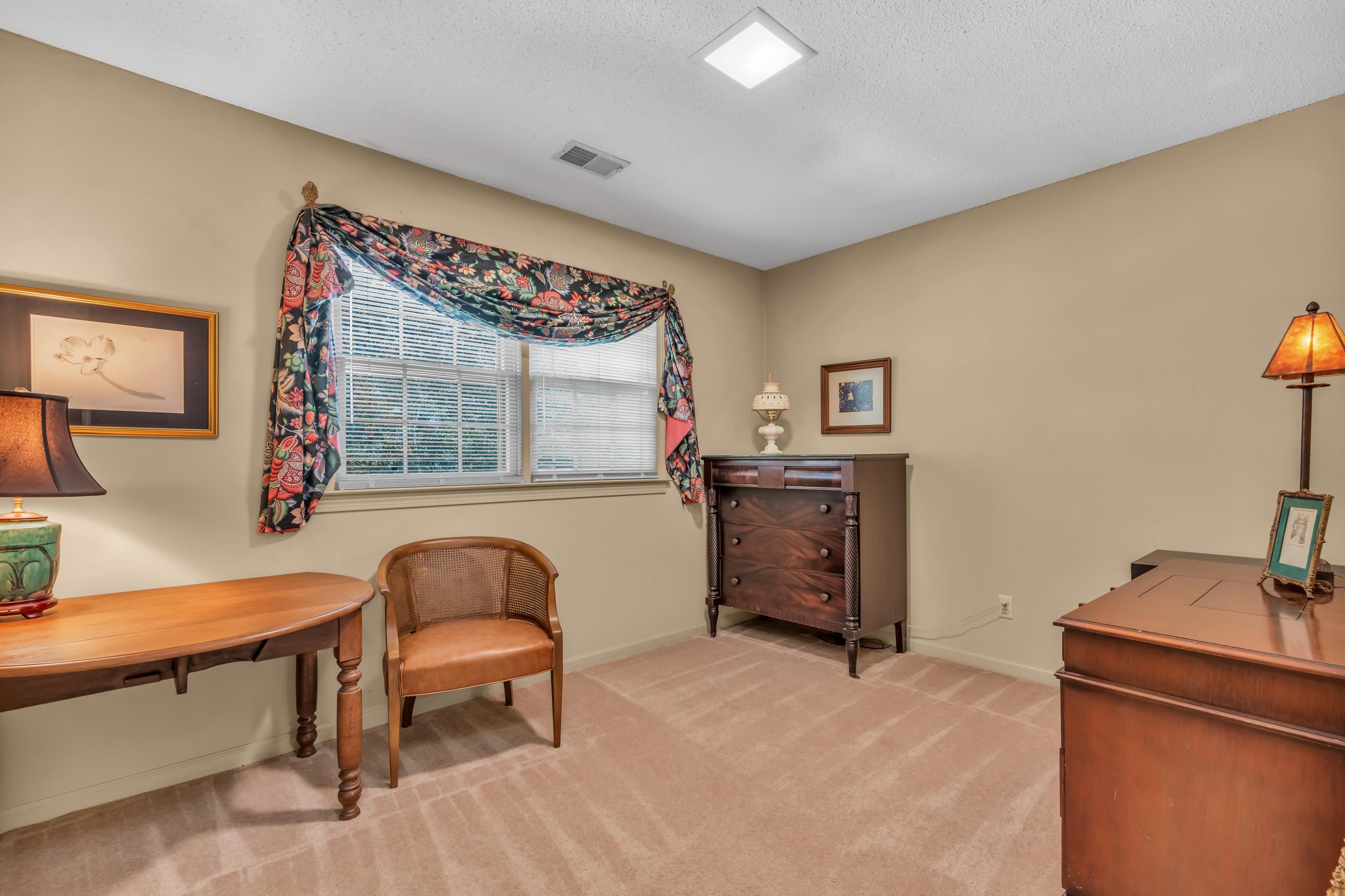 2002 Magnolia Ridge Cove Germantown, TN 38138 - Photo 30 of 40 Sitting room featuring a textured ceiling and light colored carpet
