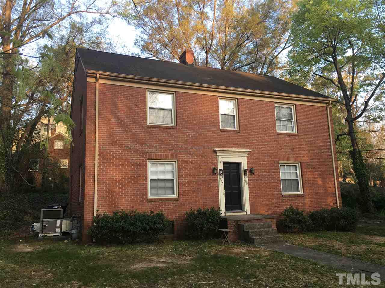207 Brooks Avenue Raleigh, NC 27607 - Photo 2 of 3 a brick building that has a lots of windows in it