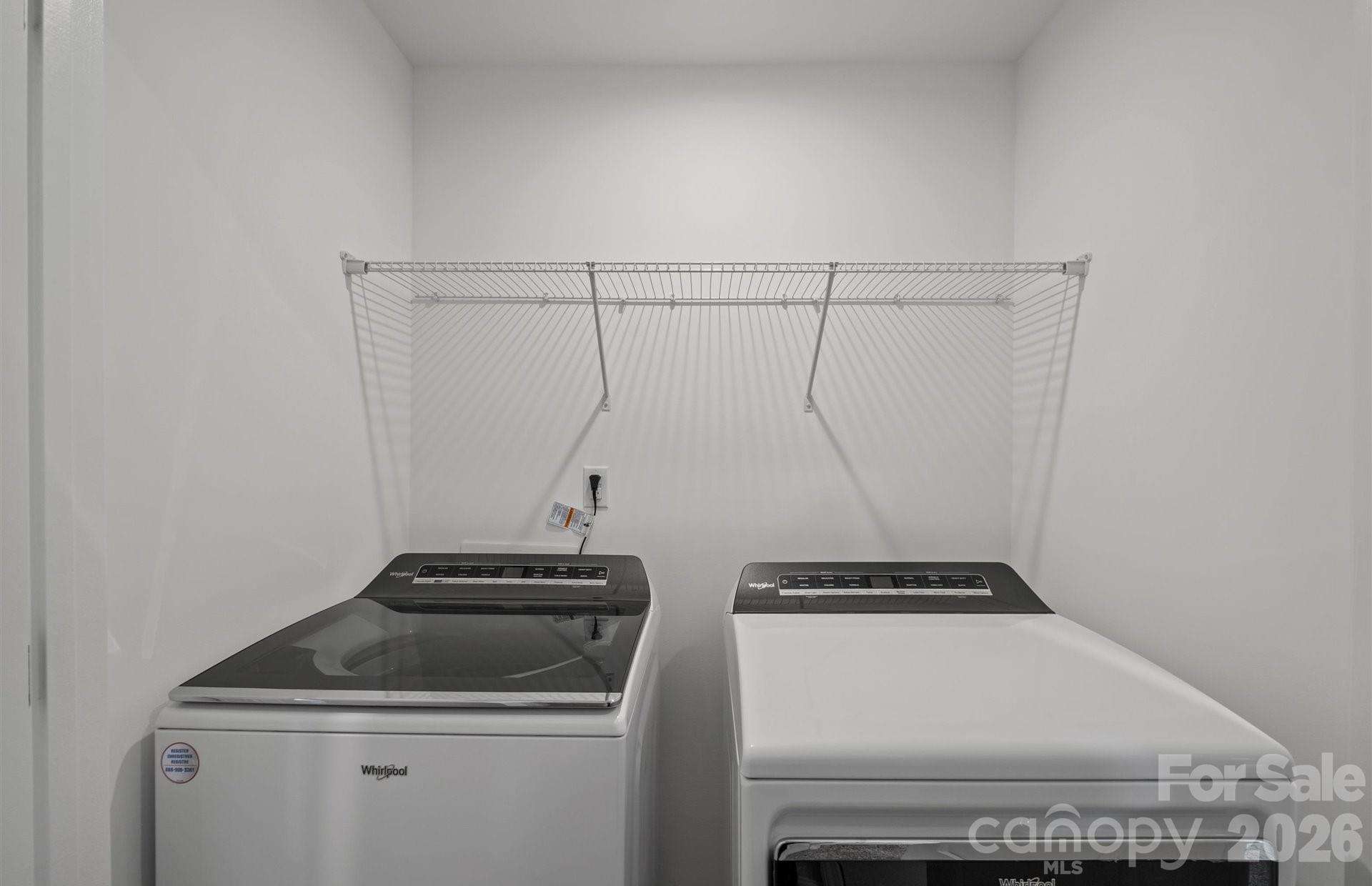 2104 Cobble Court Monroe, NC 28110 - Photo 13 of 15 a close view of washer and dryer