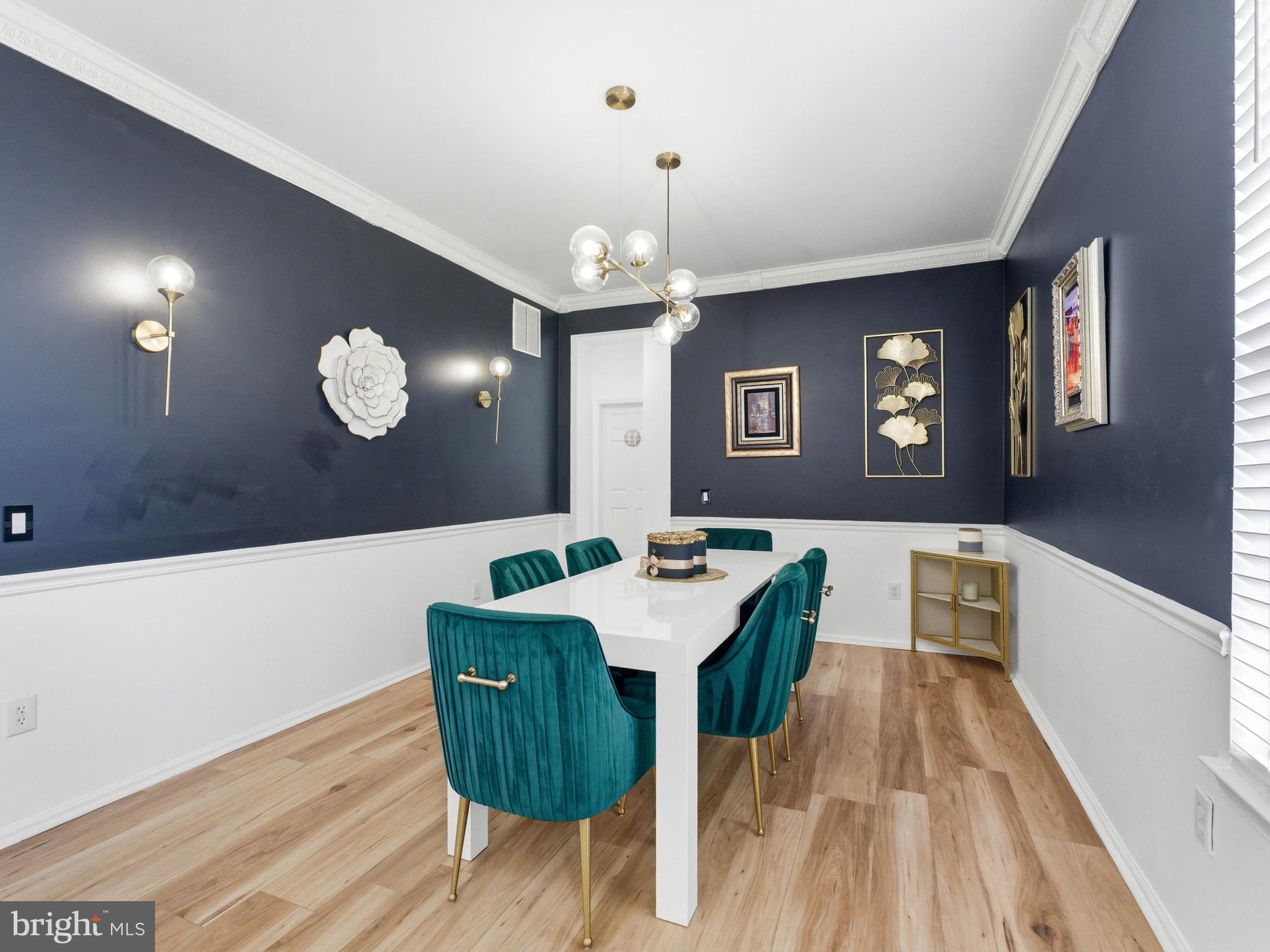 101 Weatherhill Court Hainesport, NJ 08036 - Photo 6 of 41 a view of a dining room with furniture a chandelier and wooden floor