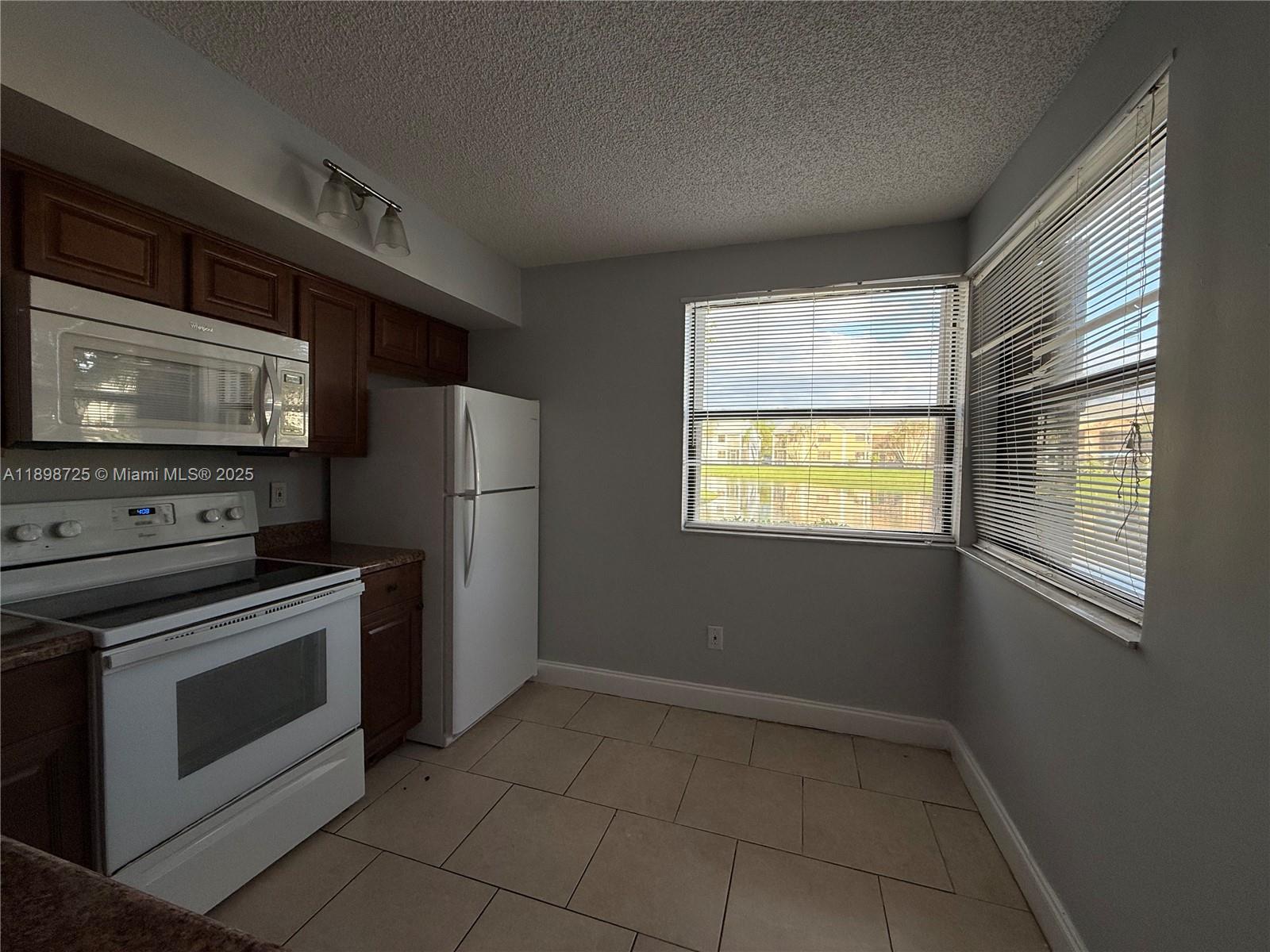 1071 Adams Avenue, Unit 1071J Homestead, FL 33034 - Photo 4 of 16