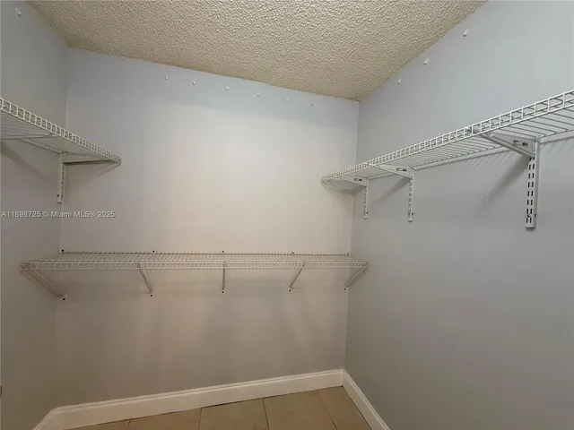 a view of small space with racks on the wall