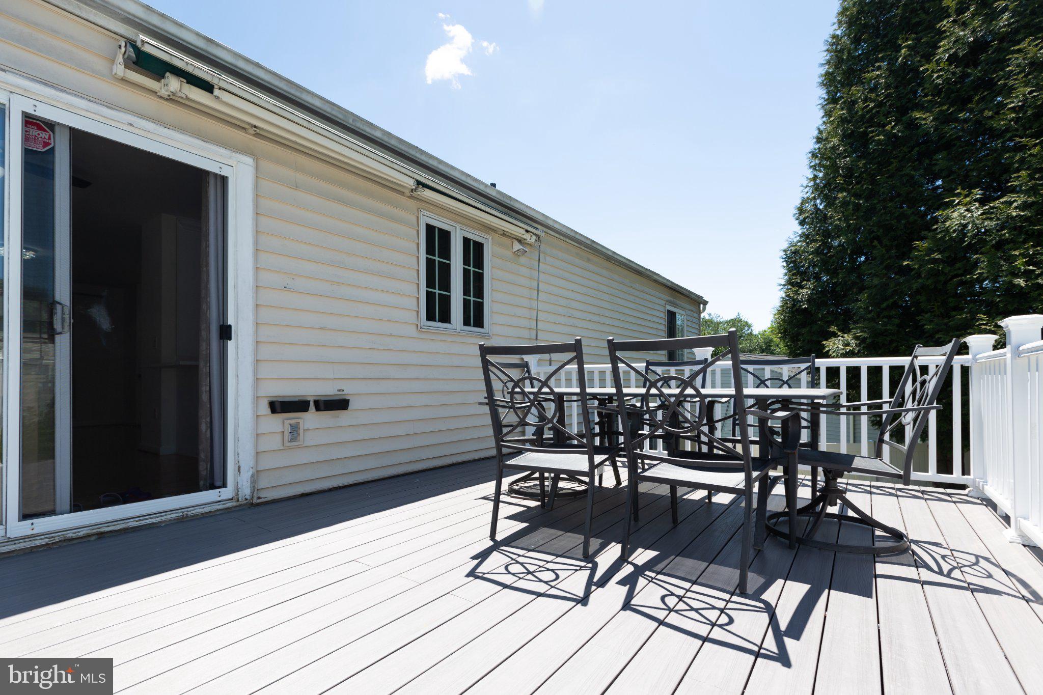 3613 Rusty Rim Ellicott City, MD 21043 - Photo 37 of 39 Sunny deck perfect for gatherings.