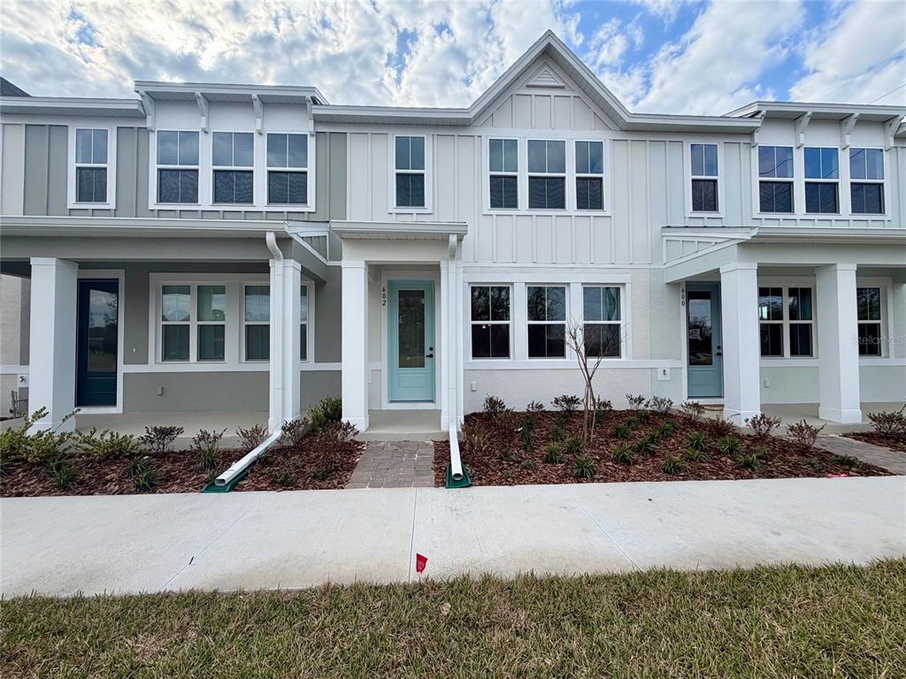 602 Highfalls Avenue DeBary, FL 32713 - Photo 1 of 29 a front view of a house with windows