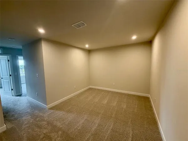 an empty room with a natural light