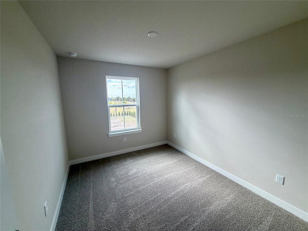 602 Highfalls Avenue DeBary, FL 32713 - Photo 22 of 29 an empty room with windows