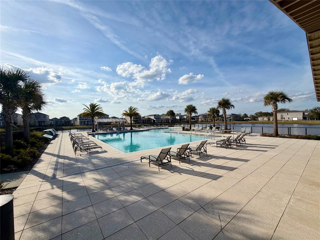 602 Highfalls Avenue DeBary, FL 32713 - Photo 29 of 29 a view of a swimming pool and lounge chairs