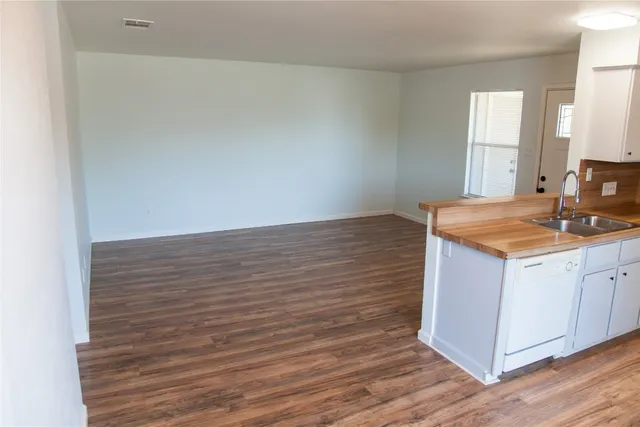 a bathroom with a toilet and a bathtub