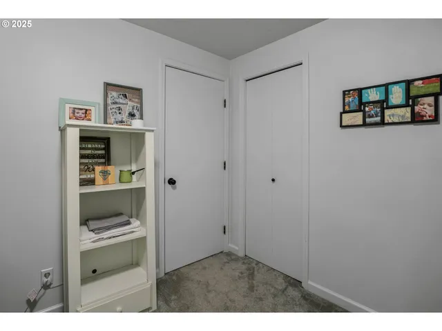 a view of a bathroom from a hallway