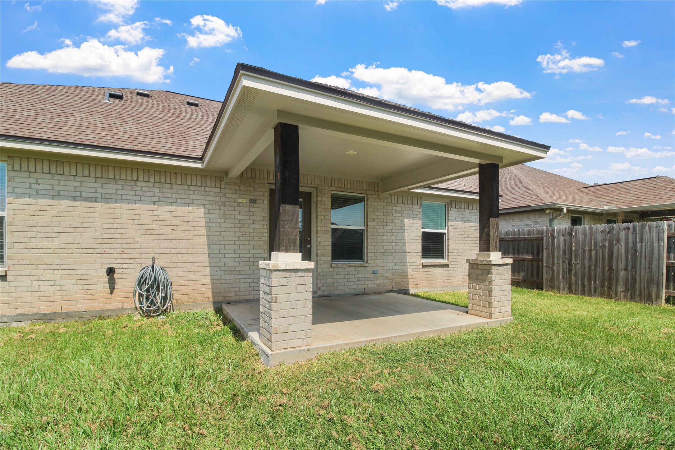 1208 East Henderson Road Angleton, TX 77515 - Photo 26 of 29 a view of a house with backyard and a tree