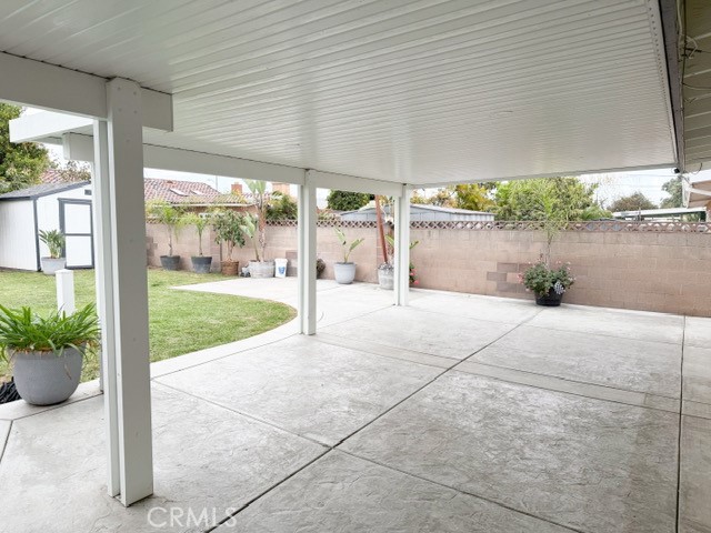 7414 Blackhawk Circle Buena Park, CA 90620 - Photo 13 of 15 a view of a porch with potted plants