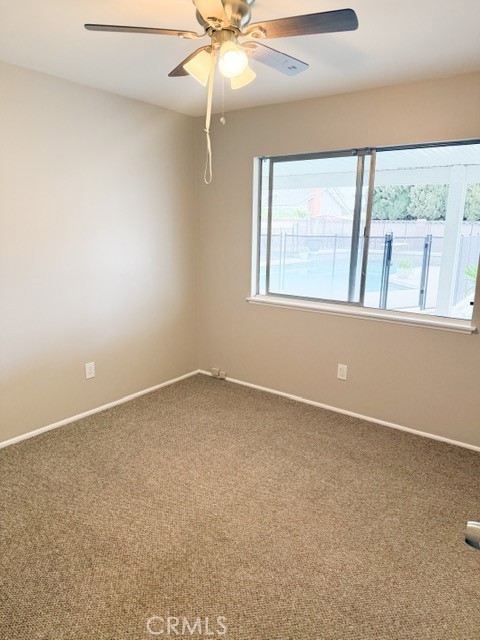 7414 Blackhawk Circle Buena Park, CA 90620 - Photo 7 of 15 an empty room with a window