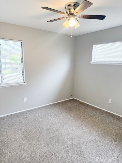7414 Blackhawk Circle Buena Park, CA 90620 - Photo 8 of 15 an empty room with a window and a fan