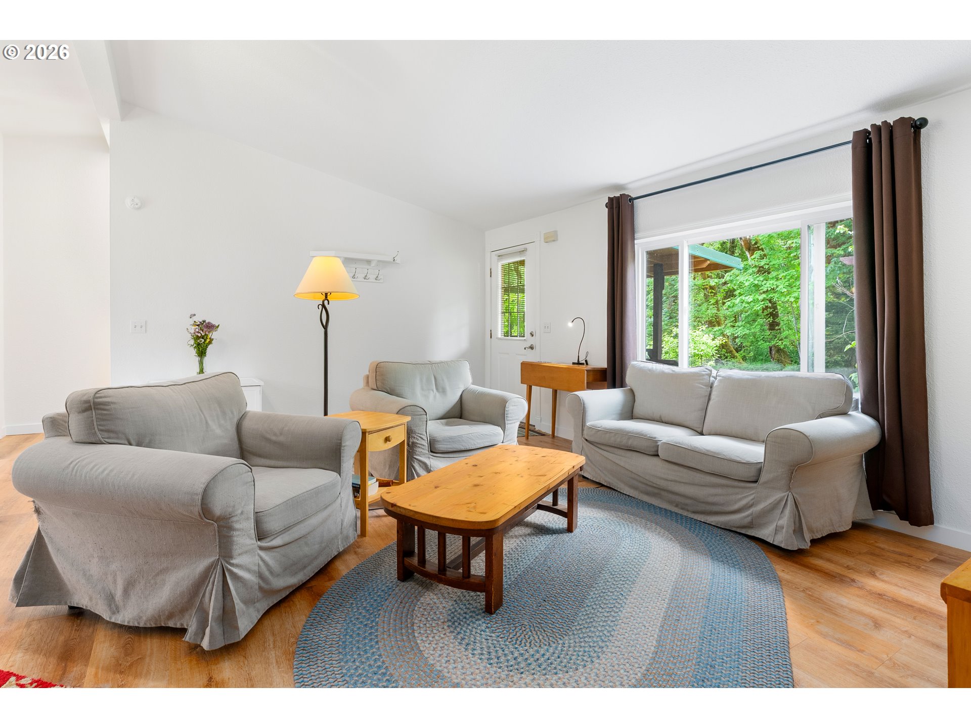 451 Cannavinna Road Carson, WA 98610 - Photo 9 of 33 a living room with furniture and a large window