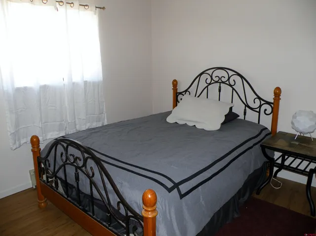 a close view of a sink a table and chairs