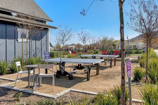 a view of chairs and tables in a patio