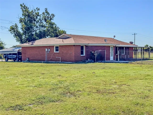 front view of a house with a big yard