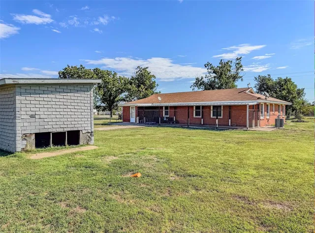 a view of a house with a swimming pool