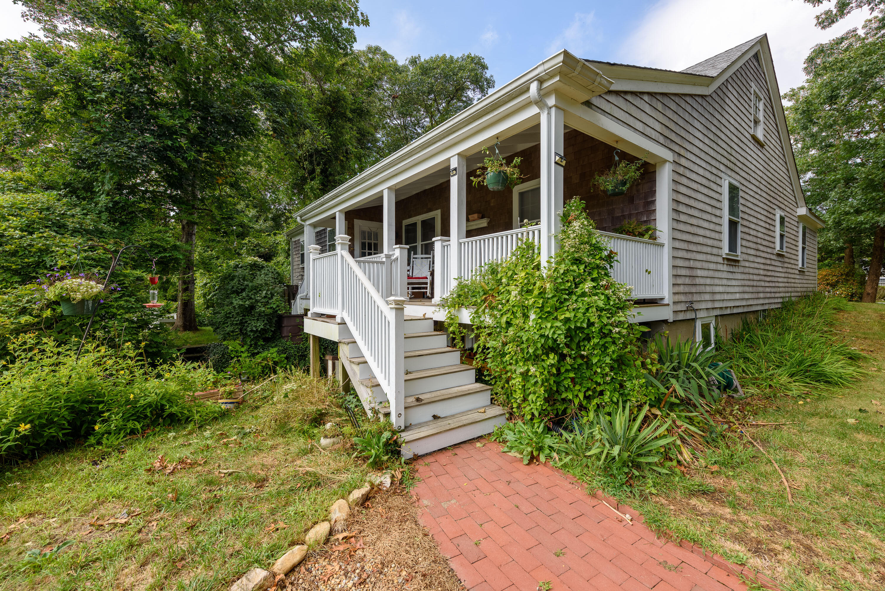 90 West Tisbury Road Edgartown, MA 02539 - Photo 5 of 46 a view of a house with a yard