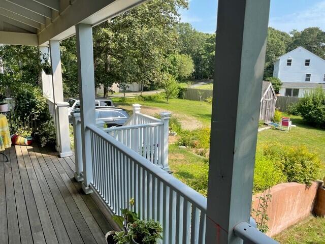 90 West Tisbury Road Edgartown, MA 02539 - Photo 8 of 46 a view of balcony with wooden floor