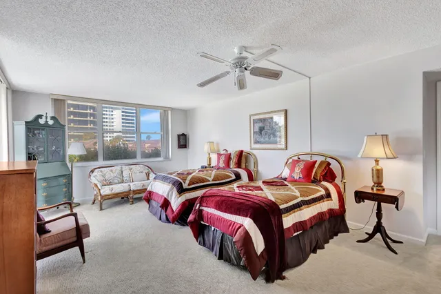 a bath room with a bath tub and a shower