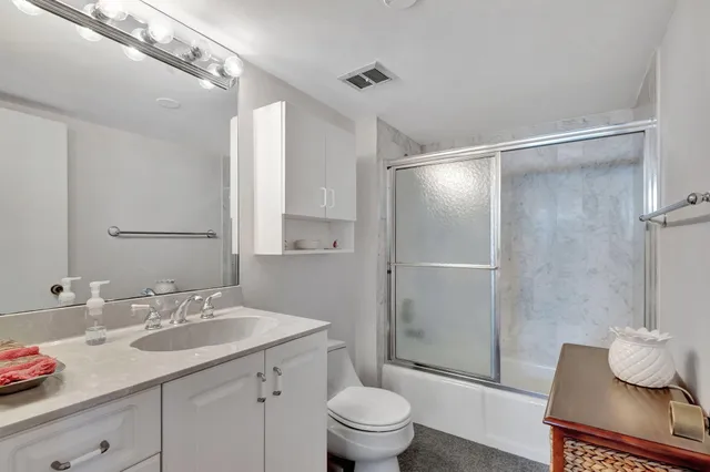 a view of a balcony with yard