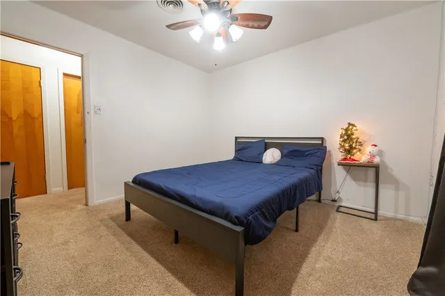a living room with a table and window