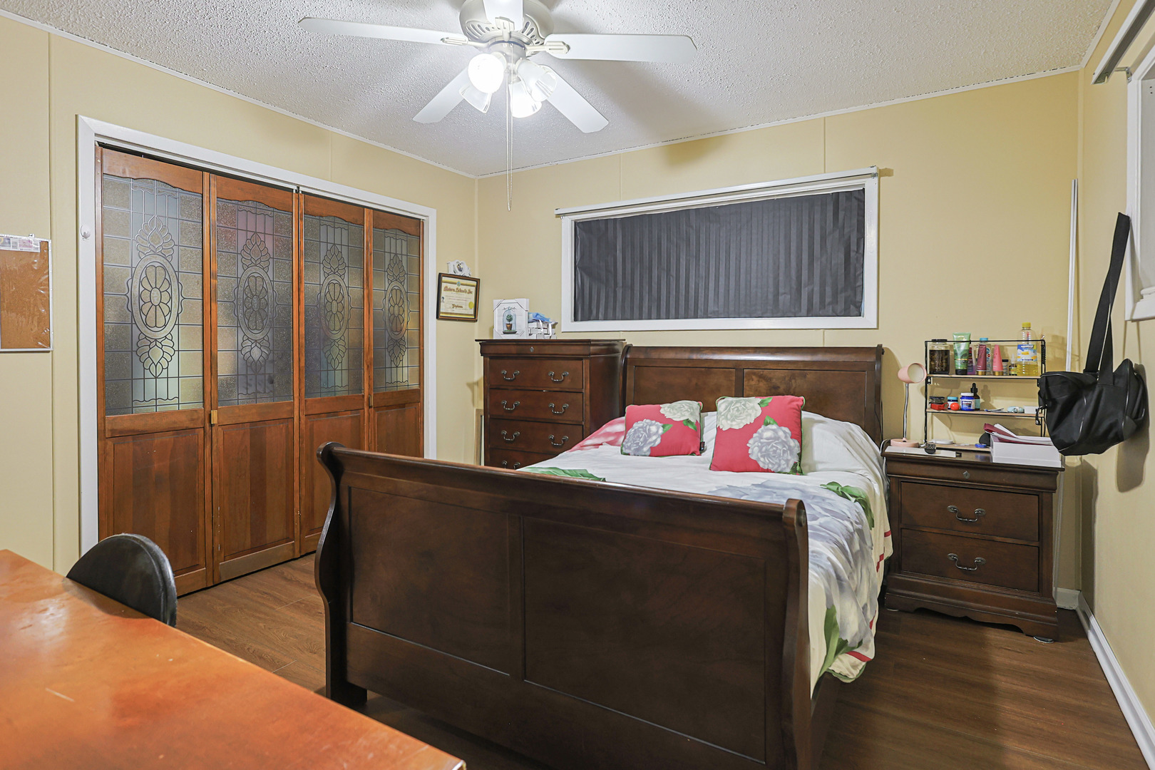 372 Nancy Lane Wheeling, IL 60090 - Photo 13 of 28 a bedroom with a bed and wooden floor
