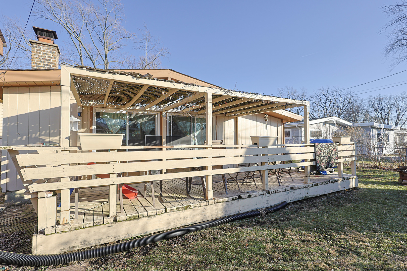 372 Nancy Lane Wheeling, IL 60090 - Photo 25 of 28 a view of a house with a wooden deck
