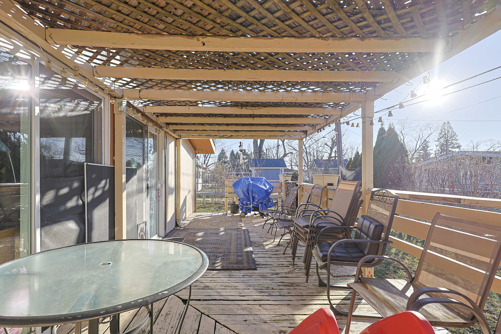 372 Nancy Lane Wheeling, IL 60090 - Photo 27 of 28 a view of a dining room with furniture wooden floor and chandelier