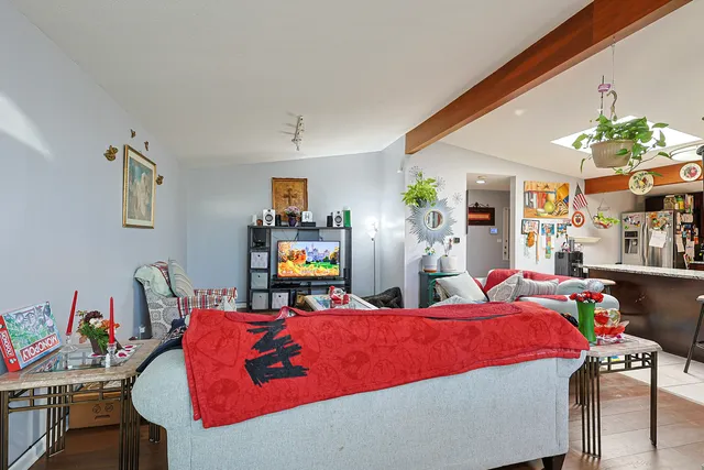 a bed room with two bed and a couch