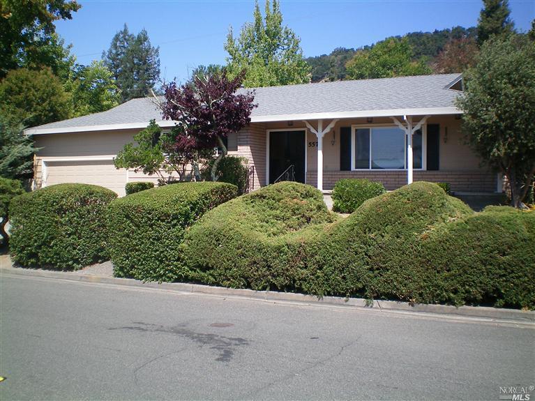 5579 Monte Verde Drive Santa Rosa, CA 95409 - Photo 1 of 1 a front view of a house with a yard and garage
