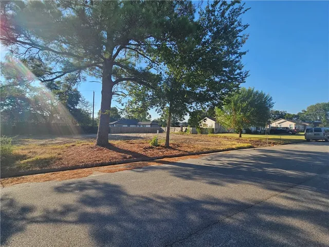 a view of yard with tree s