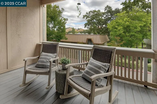 a view of a chair in wooden deck
