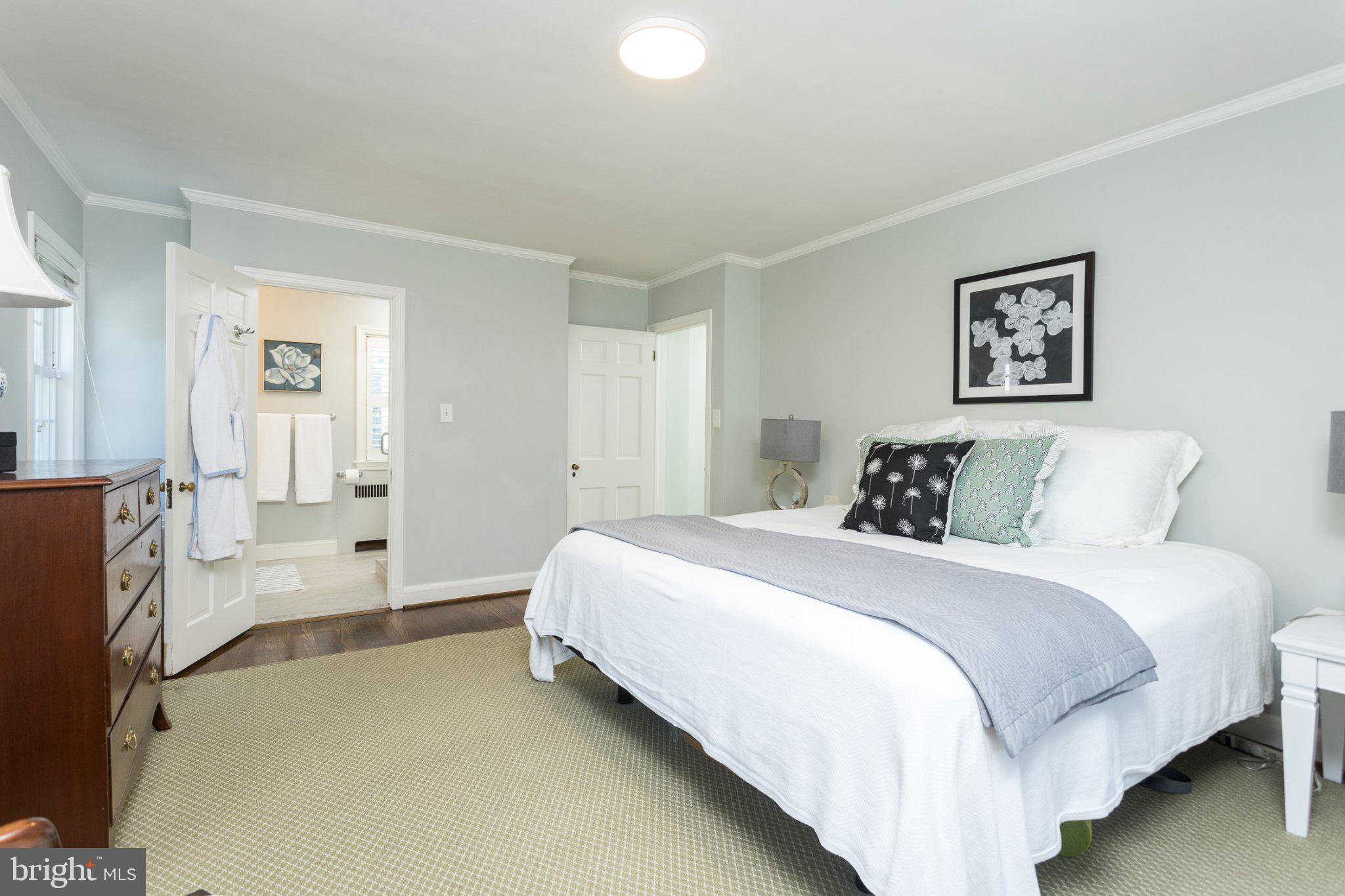 7107 Bristol Road Baltimore, MD 21212 - Photo 21 of 48 Serene bedroom with modern elegance.
