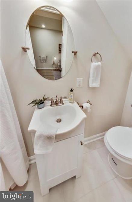 1720 H Street Northeast, Unit A Washington, DC 20002 - Photo 14 of 31 Charming bathroom with modern elegance.