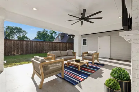 a outdoor living space with furniture and a garden