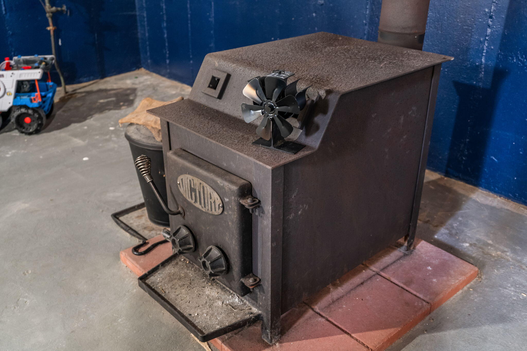 352 Main Road Eddington, ME 04428 - Photo 31 of 43 Basement Woodstove