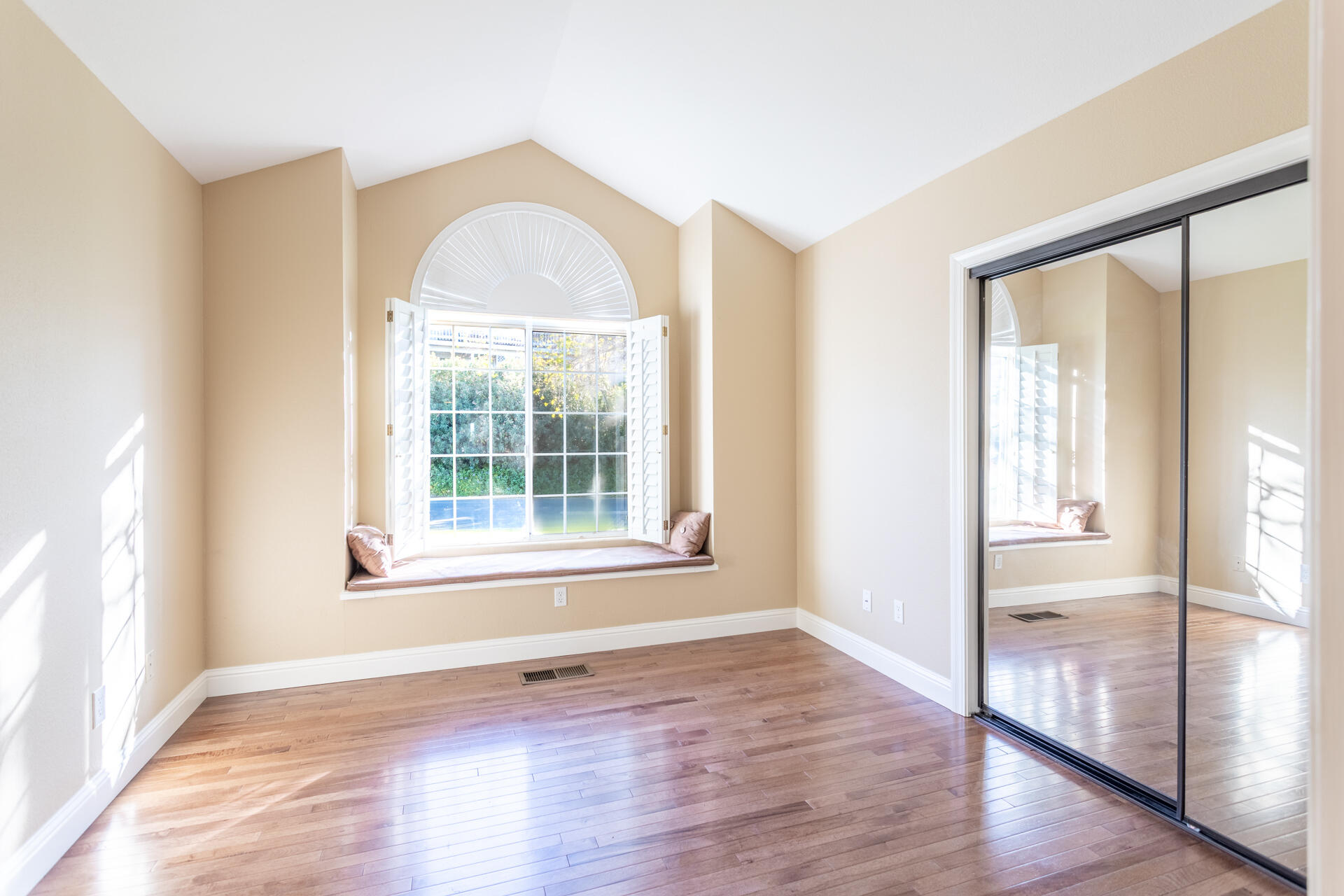 3126 Riesling Path Redding, CA 96001 - Photo 18 of 32 a view of empty room with wooden floor and fan