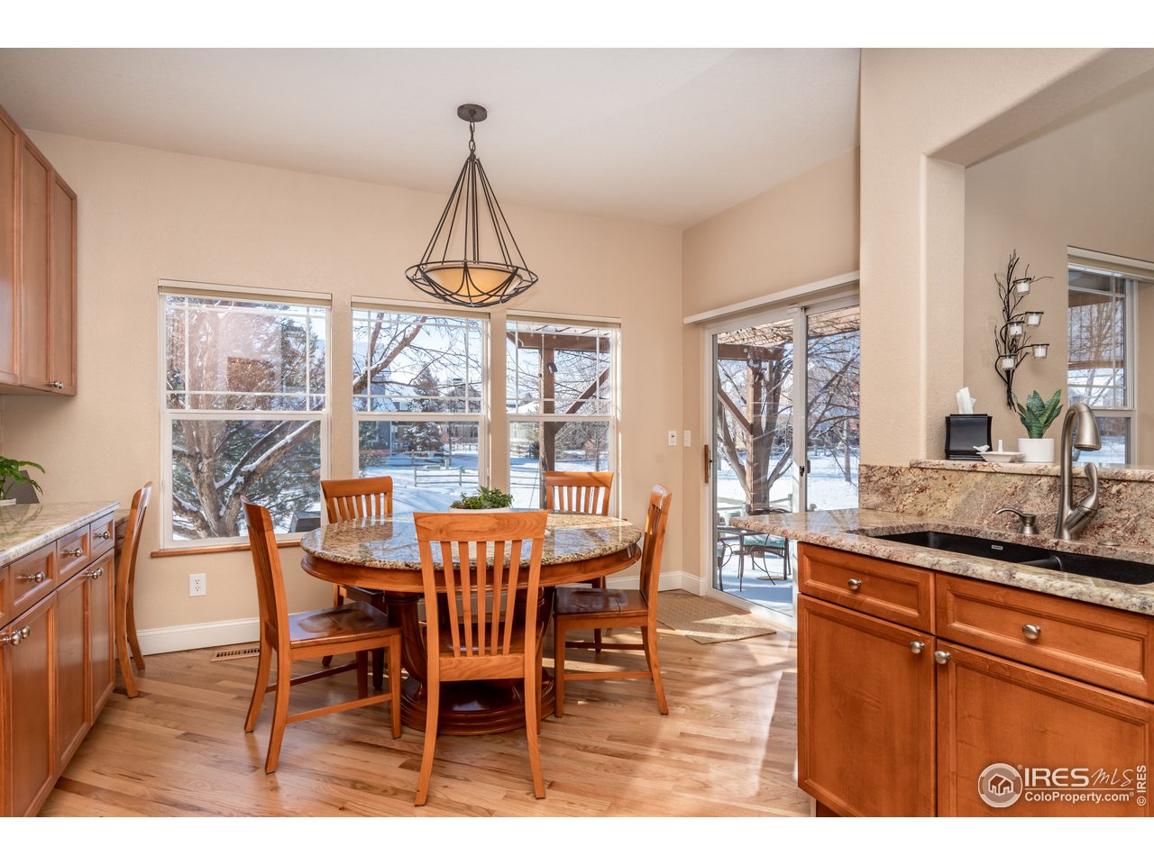 4101 Riley Drive Longmont, CO 80503 - Photo 12 of 40 Eat-In Kitchen Opening to Back Yard
