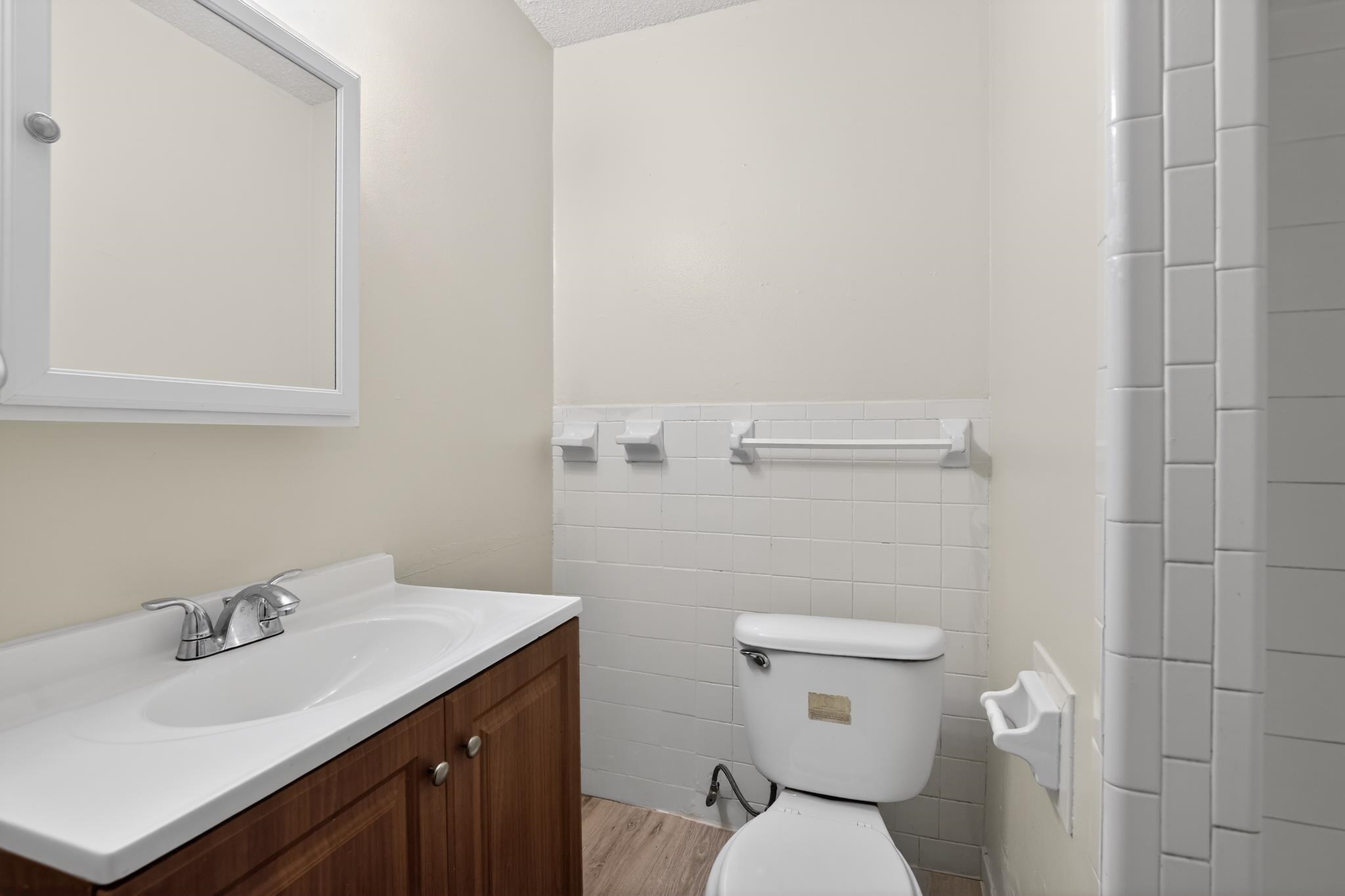 2015 East Holmes Road Memphis, TN 38116 - Photo 30 of 34 a bathroom with a sink toilet and a mirror