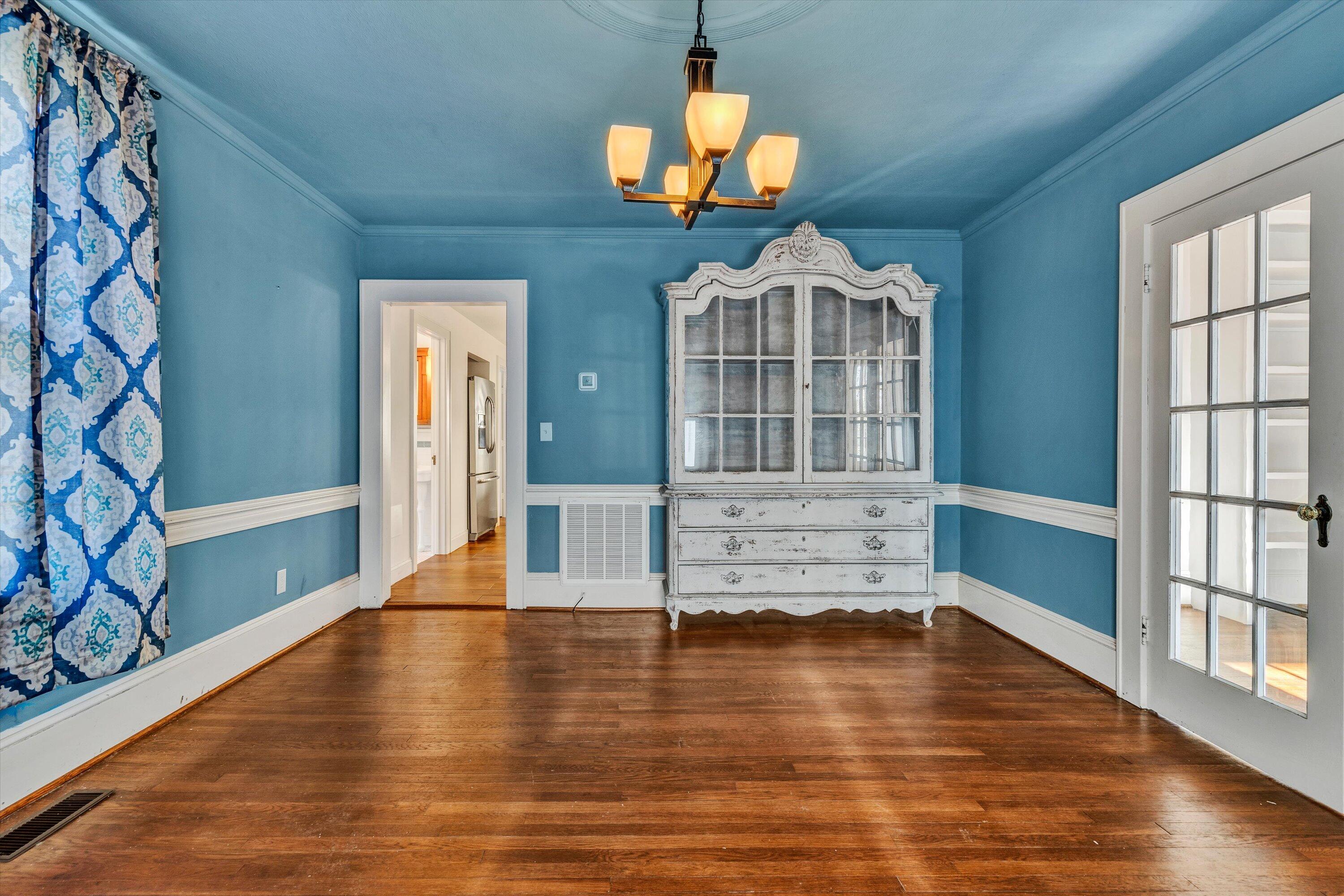 370 Rustic Ridge Road Stuart, VA 24171 - Photo 11 of 42 wooden floor in an empty room with a window
