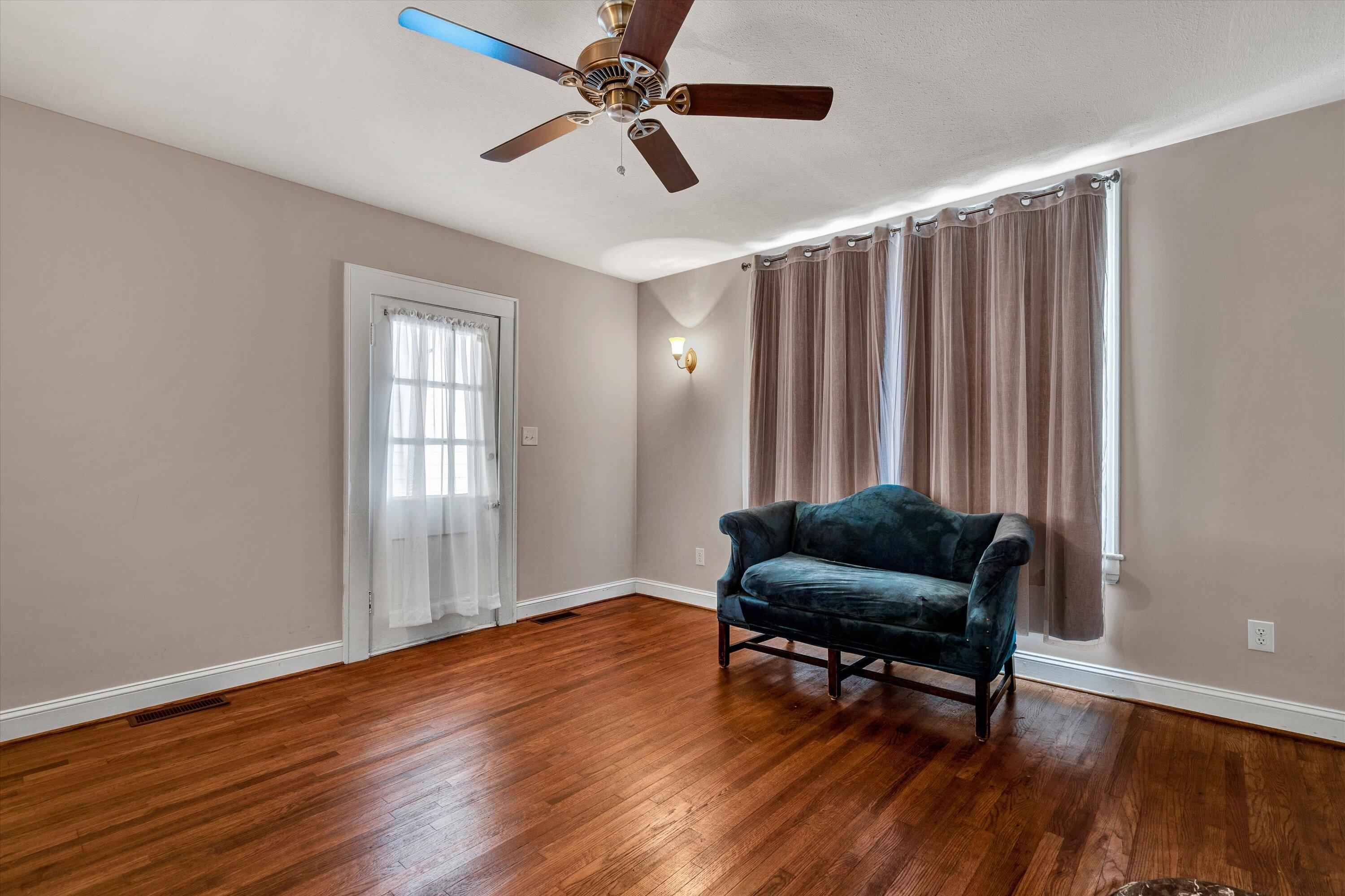 370 Rustic Ridge Road Stuart, VA 24171 - Photo 13 of 42 a living room with furniture and a window