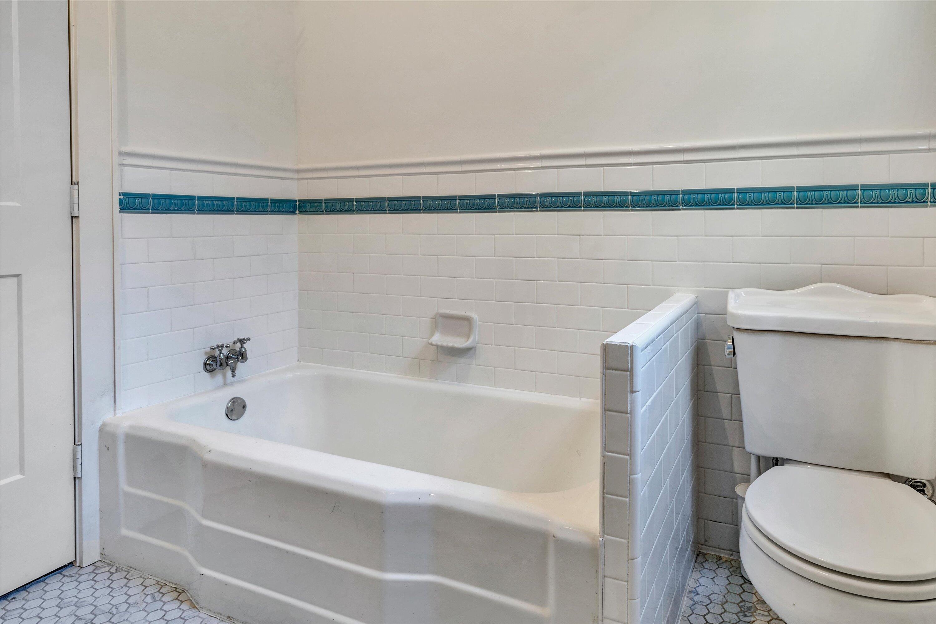 370 Rustic Ridge Road Stuart, VA 24171 - Photo 15 of 42 a bathroom with a bathtub and a shower
