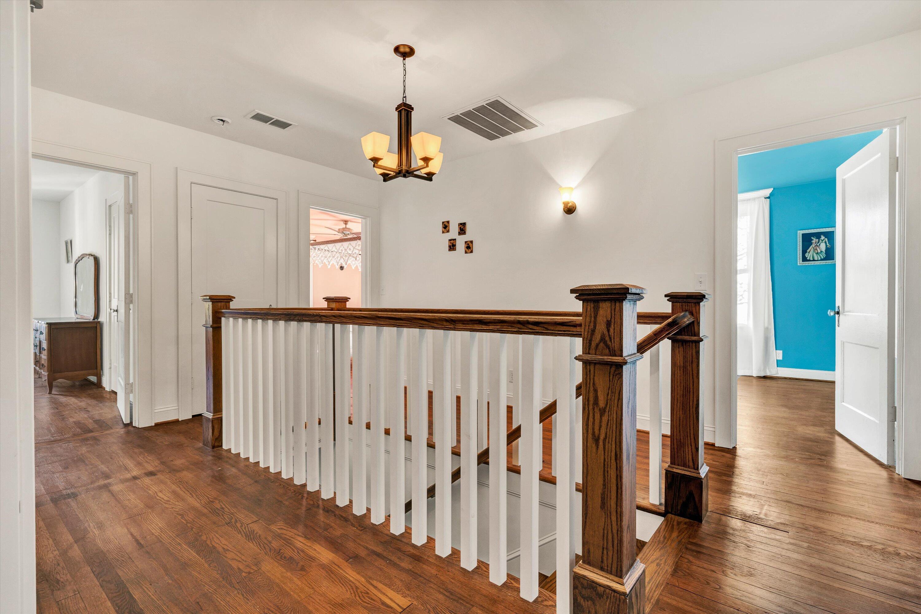 370 Rustic Ridge Road Stuart, VA 24171 - Photo 17 of 42 a view of a hallway with wooden floor and stairs