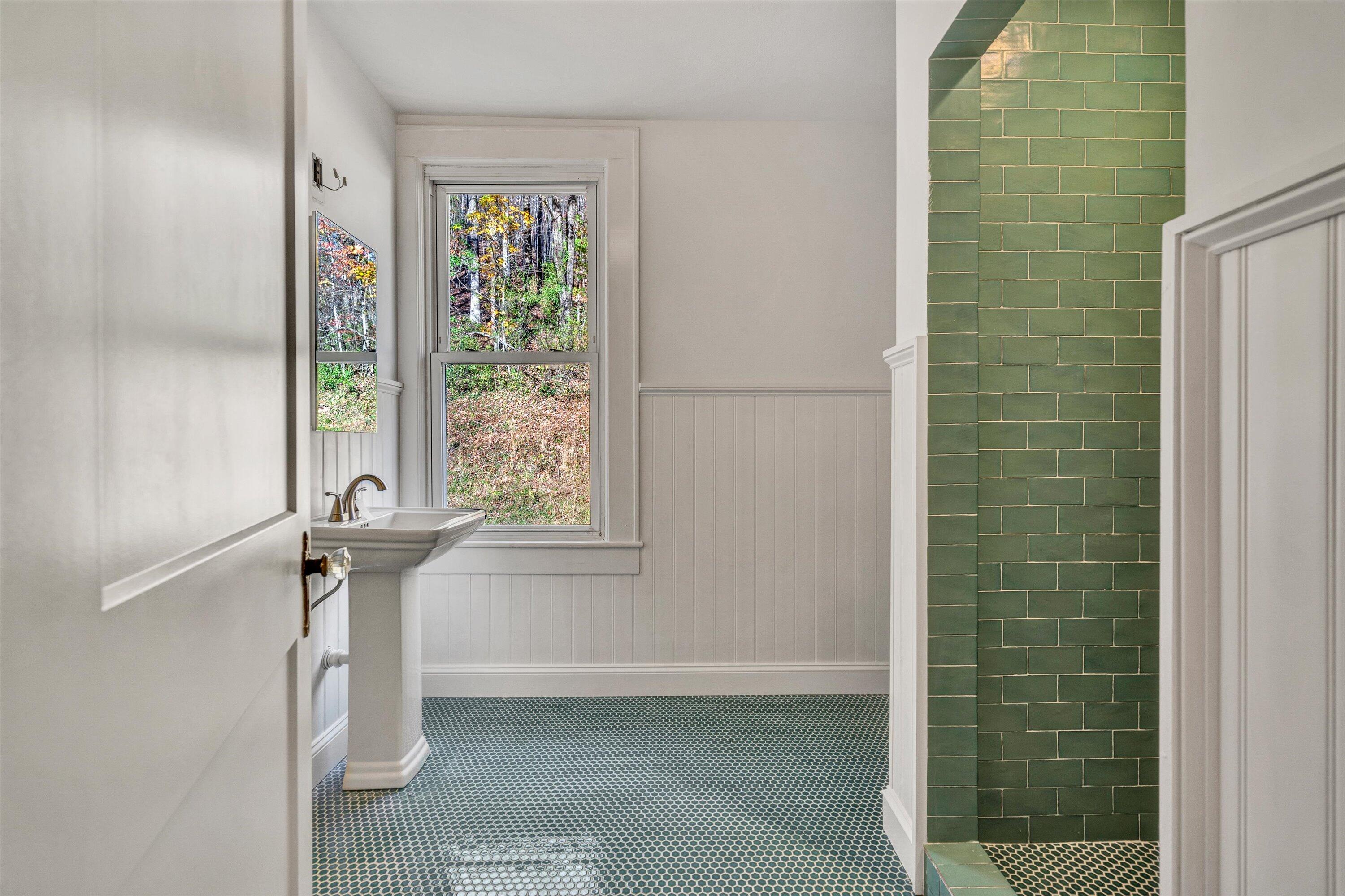 370 Rustic Ridge Road Stuart, VA 24171 - Photo 25 of 42 a bathroom with a shower