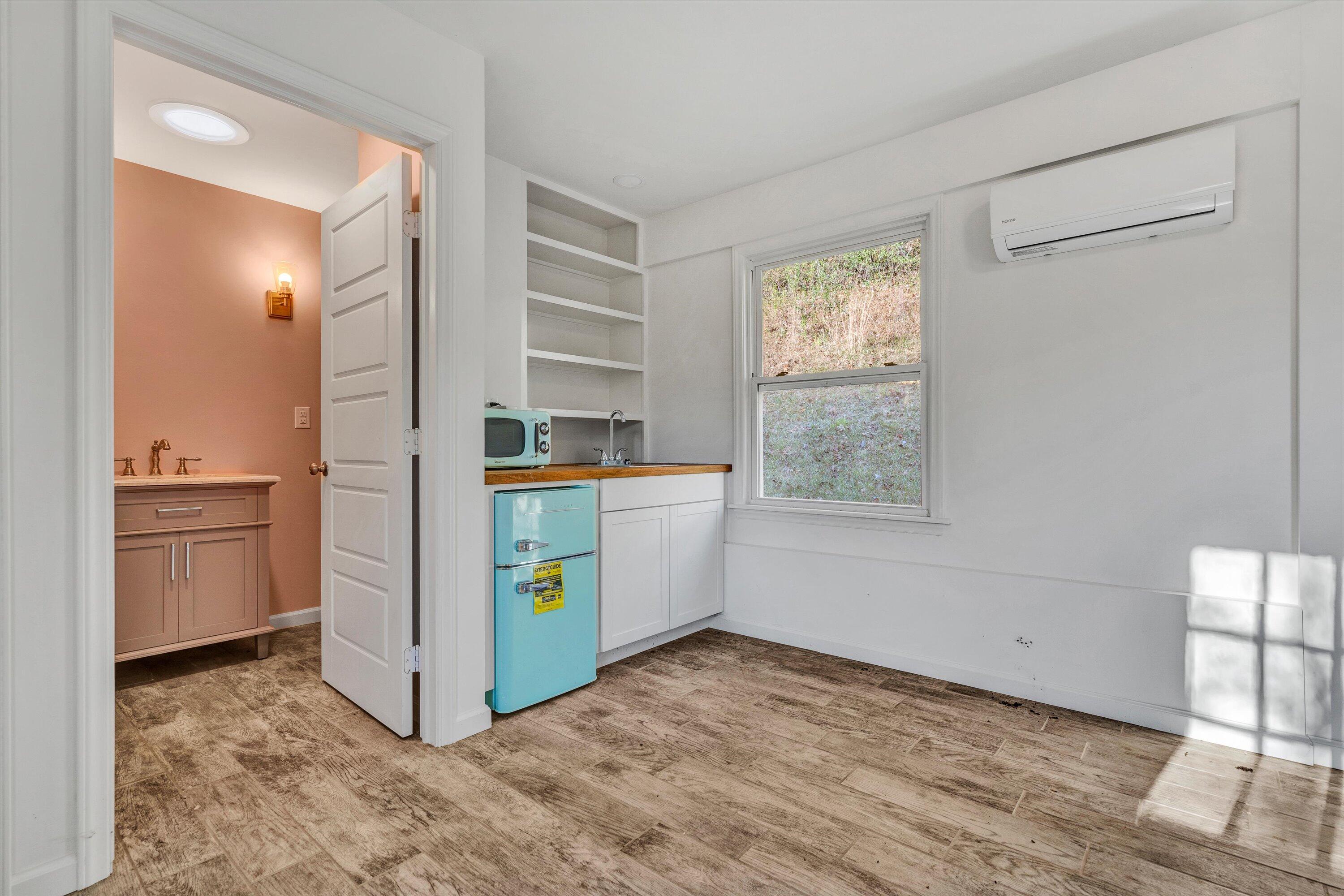 370 Rustic Ridge Road Stuart, VA 24171 - Photo 29 of 42 a kitchen with stainless steel appliances a refrigerator and a stove