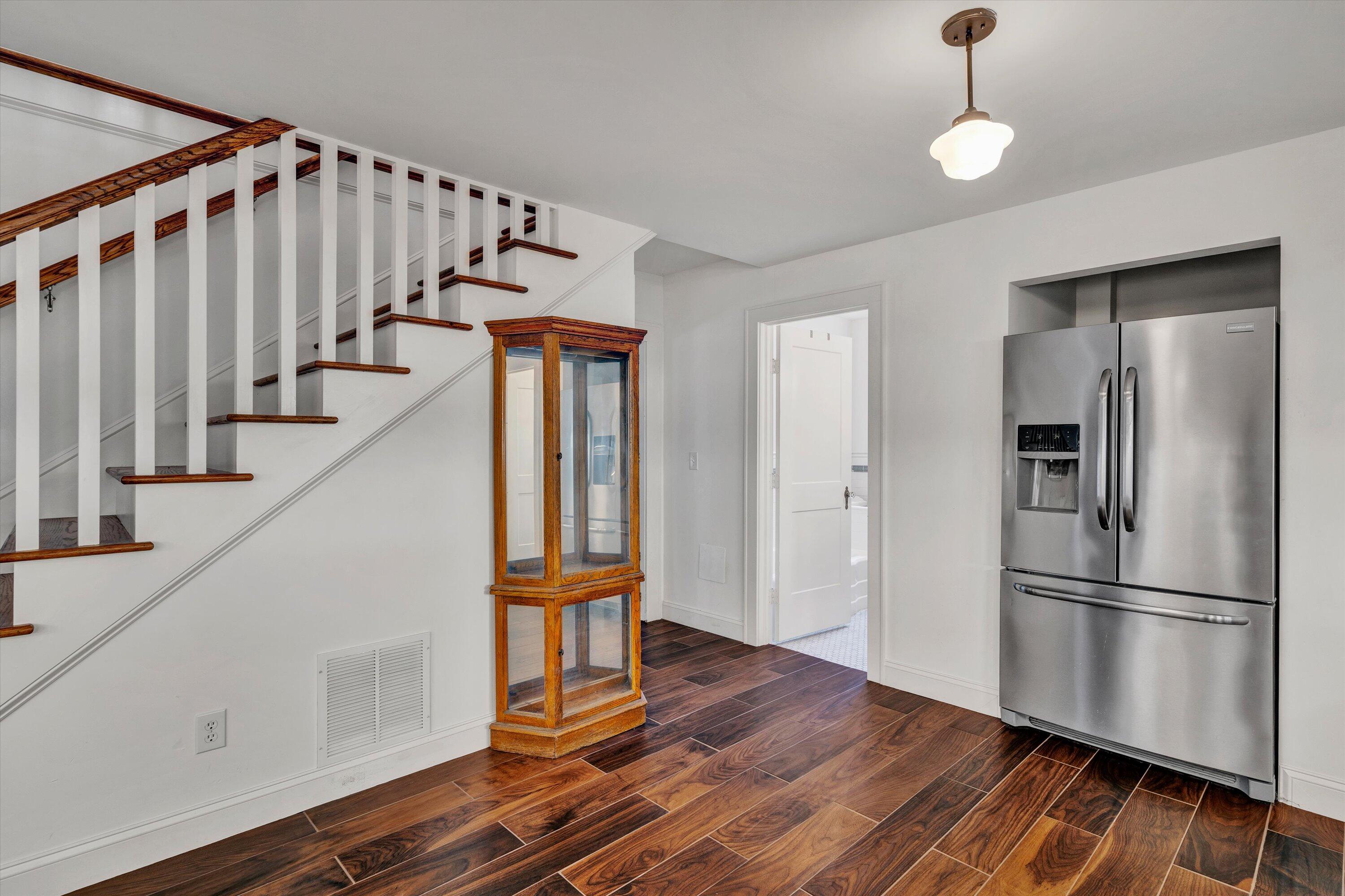 370 Rustic Ridge Road Stuart, VA 24171 - Photo 6 of 42 a view of entryway with wooden floor and stairs