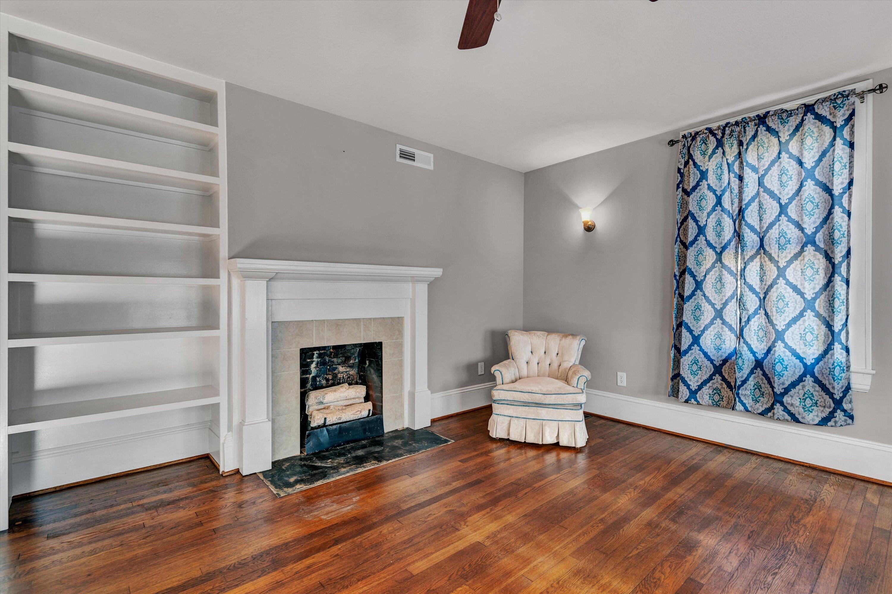 370 Rustic Ridge Road Stuart, VA 24171 - Photo 8 of 42 a living room with furniture and a fireplace